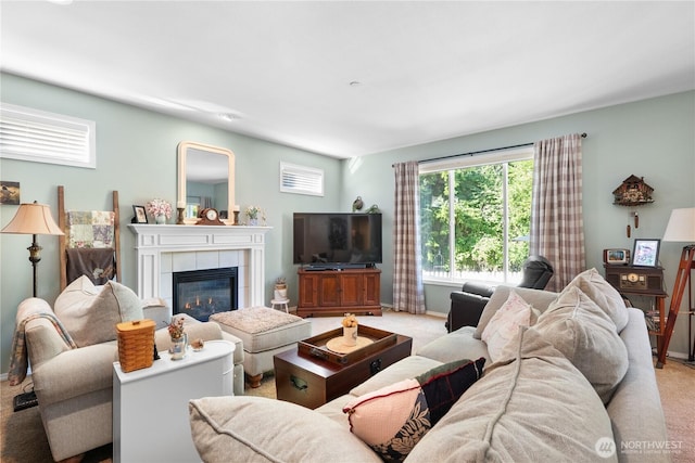 2060 Hammond Ave, Dupont, WA 98327 - living area featuring light carpet and a tiled fireplace