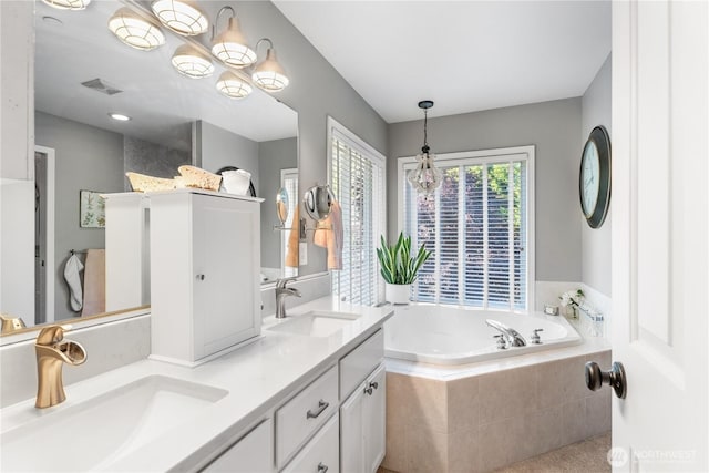 2060 Hammond Ave, Dupont, WA 98327 - full bathroom featuring double vanity and a garden tub