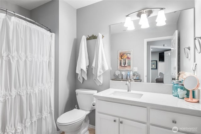2060 Hammond Ave, Dupont, WA 98327 - full bathroom featuring vanity and a shower with shower curtain