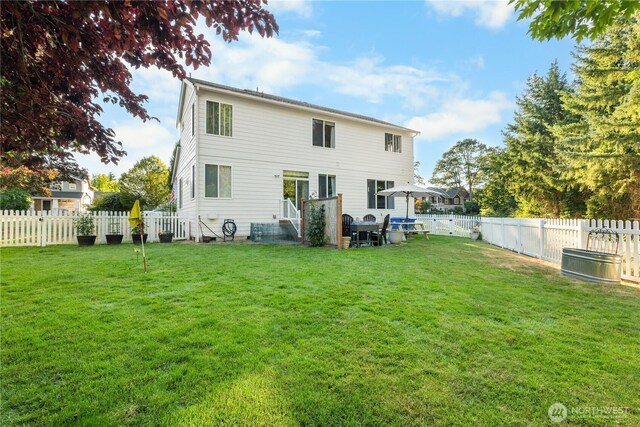 2060 Hammond Ave, Dupont, WA 98327 - back of house with a fenced backyard
