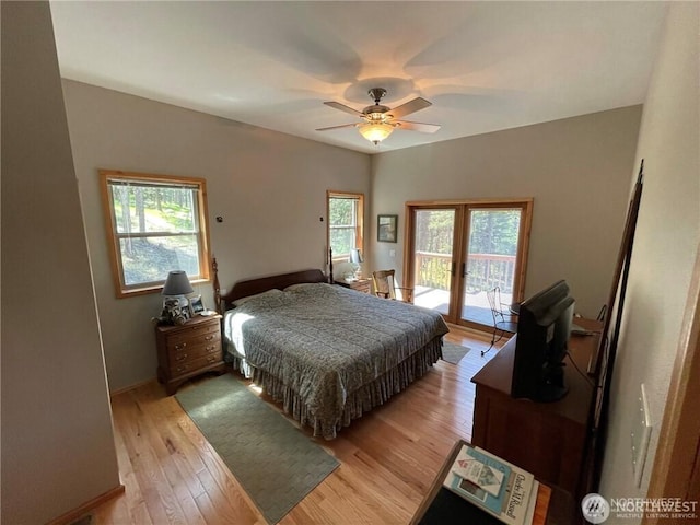4 Ruger Rd, Oroville, WA 98844 - bedroom with access to outside, multiple windows, light wood-type flooring, and ceiling fan