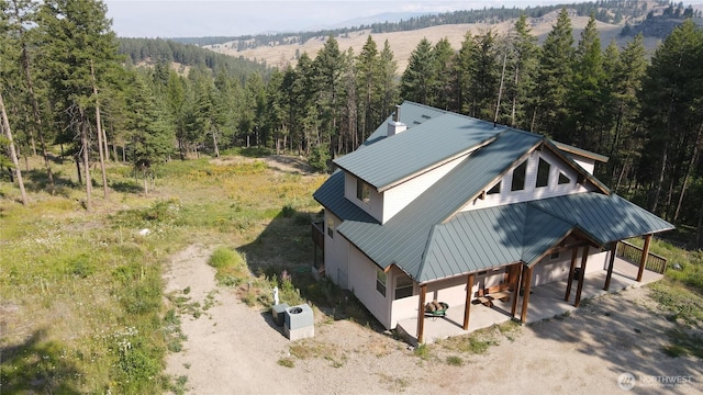 4 Ruger Rd, Oroville, WA 98844 - view from above of property with a heavily wooded area
