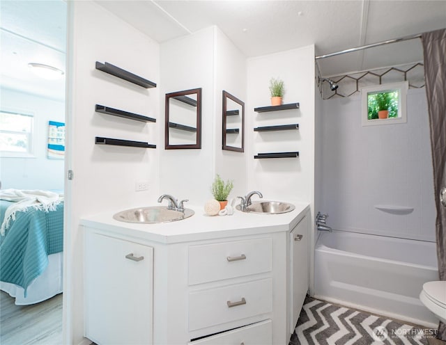 2500 Samish Way Unit 13, Bellingham, WA 98229 - full bathroom featuring double vanity, shower / tub combo with curtain, and healthy amount of natural light