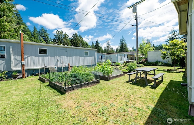 2500 Samish Way Unit 13, Bellingham, WA 98229 - view of green lawn featuring a garden