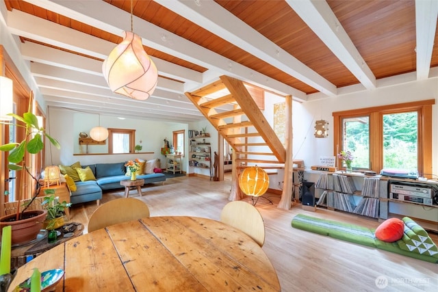 1692 Galbraith Ln, Bellingham, WA 98229 - dining space with beam ceiling, wood finished floors, healthy amount of natural light, and stairway