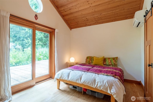 1692 Galbraith Ln, Bellingham, WA 98229 - bedroom with vaulted ceiling, wood finished floors, access to exterior, wood ceiling, and an AC wall unit