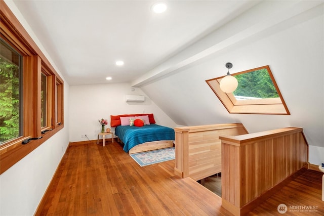 1692 Galbraith Ln, Bellingham, WA 98229 - bedroom featuring wood finished floors, multiple windows, lofted ceiling, and recessed lighting