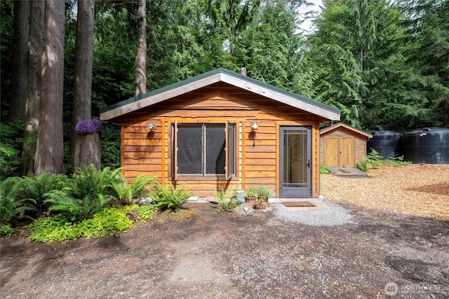 1692 Galbraith Ln, Bellingham, WA 98229 - view of front of house with a storage shed