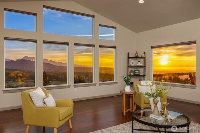 52 Carriage Dr, Sequim, WA 98382 - living room featuring dark wood-style floors, recessed lighting, a mountain view, and high vaulted ceiling