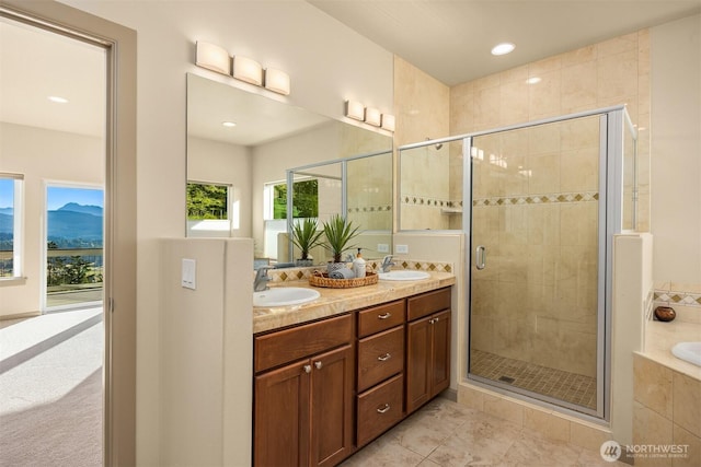 52 Carriage Dr, Sequim, WA 98382 - bathroom with double vanity, a shower stall, a bath, and recessed lighting