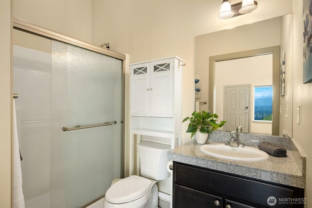 52 Carriage Dr, Sequim, WA 98382 - bathroom featuring a shower with shower door and vanity