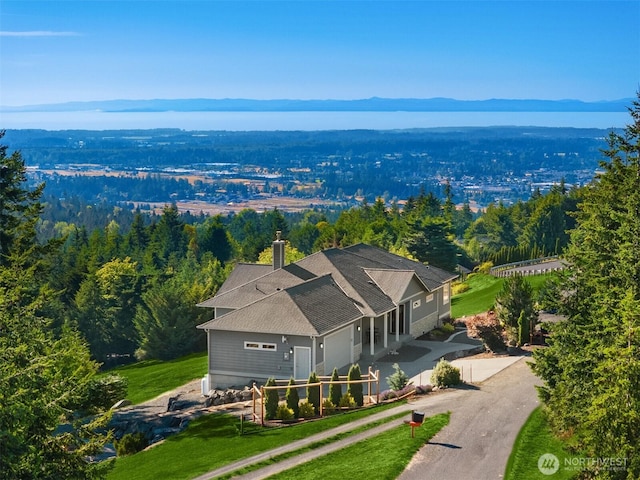 52 Carriage Dr, Sequim, WA 98382 - aerial view of property and surrounding area with a heavily wooded area