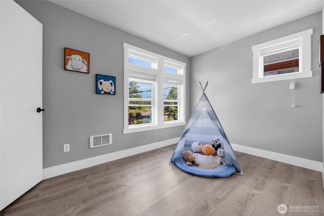 1315 Astor St, Bellingham, WA 98225 - rec room featuring wood finished floors and baseboards