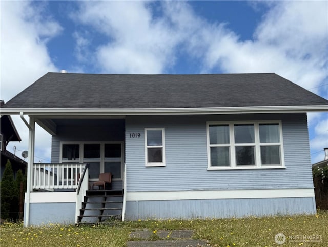 1019 Duryea St, Raymond, WA 98577 - view of front of home with covered porch and a shingled roof