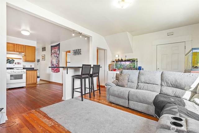 2639 Yew St, Bellingham, WA 98226 - living room featuring dark wood-style flooring and a dry bar