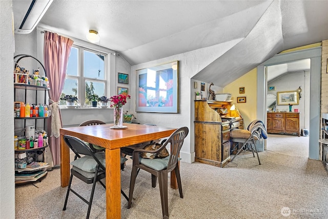 2639 Yew St, Bellingham, WA 98226 - dining area with lofted ceiling, carpet floors, and a textured ceiling
