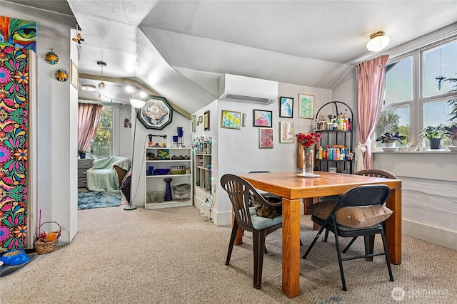 2639 Yew St, Bellingham, WA 98226 - carpeted dining area with an AC wall unit and vaulted ceiling