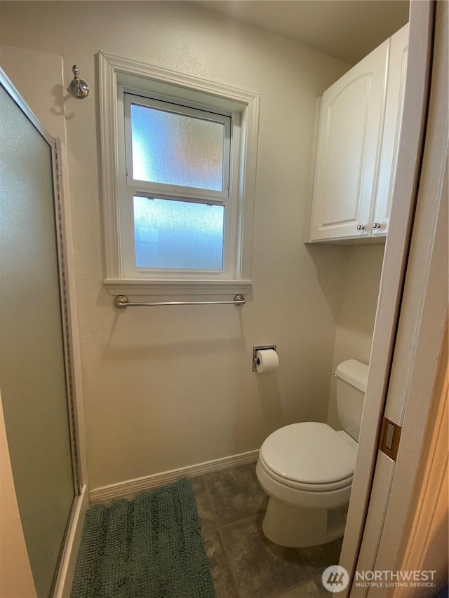 1051 Ocean Shores Blvd SW Unit 1B, Ocean Shores, WA 98569 - full bath with a shower stall and tile patterned floors