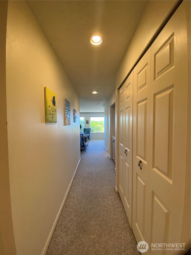 1051 Ocean Shores Blvd SW Unit 1B, Ocean Shores, WA 98569 - hall with carpet flooring and recessed lighting