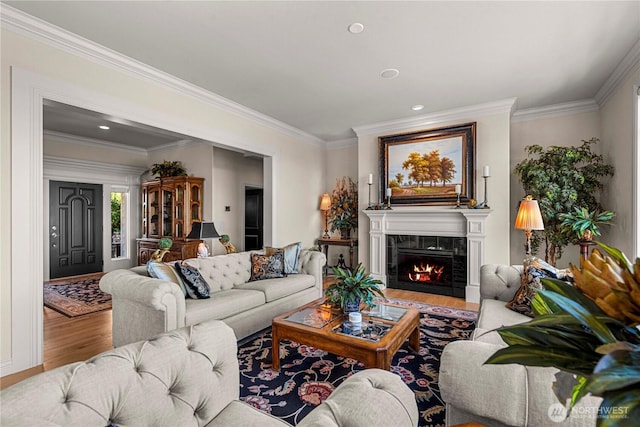 1776 Broadway Pl, Wenatchee, WA 98801 - living area featuring wood finished floors, ornamental molding, a tile fireplace, and recessed lighting
