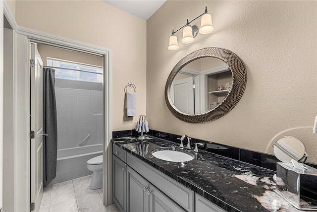 1776 Broadway Pl, Wenatchee, WA 98801 - bathroom featuring vanity, shower / bathtub combination with curtain, and marble finish floors