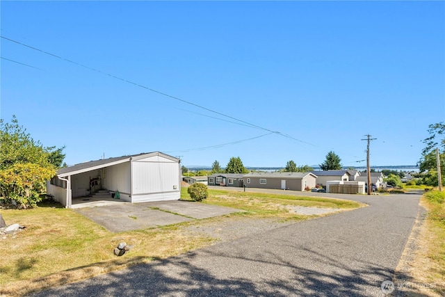 5594 Hillvue Rd, Blaine, WA 98230 - view of grassy yard featuring a carport