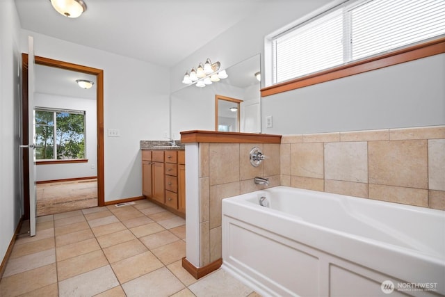 6214 Malloy Ave, Ferndale, WA 98248 - full bath featuring vanity, a garden tub, and tile patterned floors