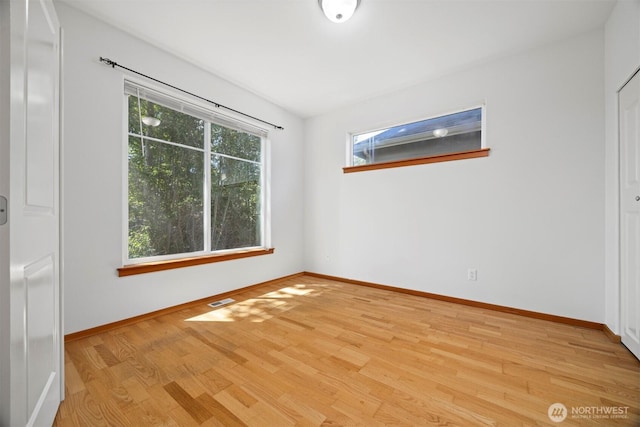 6214 Malloy Ave, Ferndale, WA 98248 - unfurnished bedroom with light wood finished floors and baseboards
