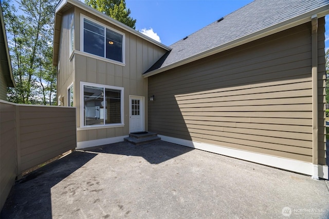 6214 Malloy Ave, Ferndale, WA 98248 - doorway to property with roof with shingles and a patio
