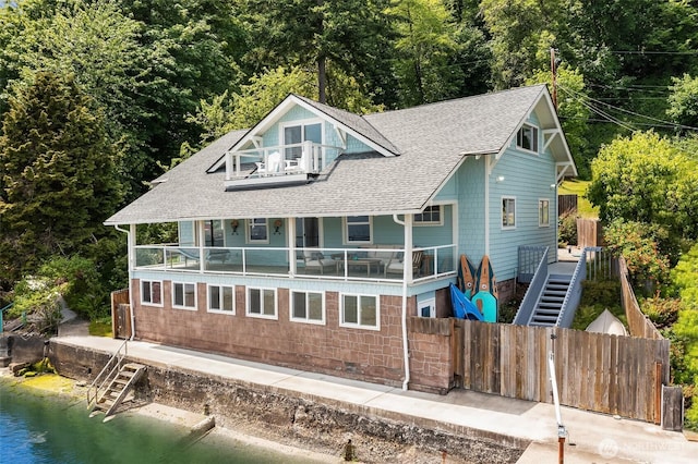 26321 Pillsbury Rd SW, Vashon, WA 98070 - back of property featuring a balcony, roof with shingles, and stairs