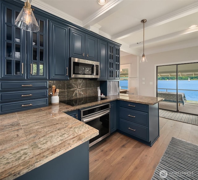 26321 Pillsbury Rd SW, Vashon, WA 98070 - kitchen featuring a peninsula, blue cabinets, crown molding, light wood-style floors, and beam ceiling