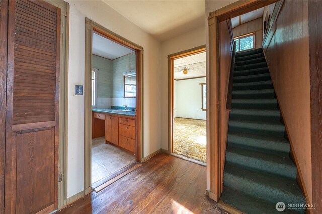 5507 N 45th St, Tacoma, WA 98407 - staircase featuring wood-type flooring and baseboards