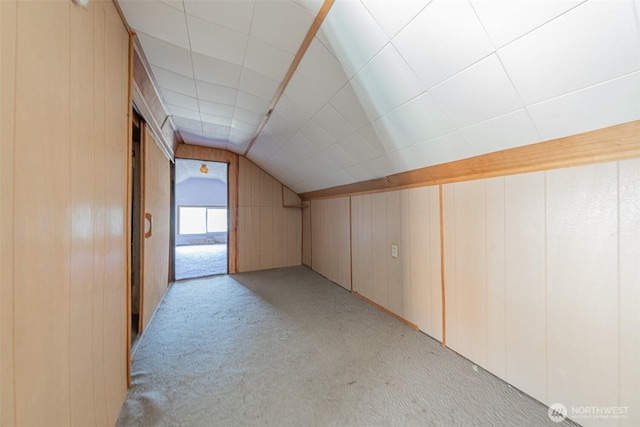 5507 N 45th St, Tacoma, WA 98407 - bonus room featuring light colored carpet, vaulted ceiling, and wood walls