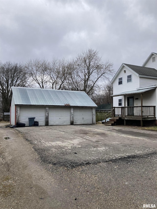 garage with covered porch