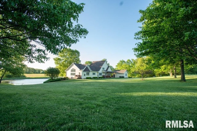 view of yard with a water view