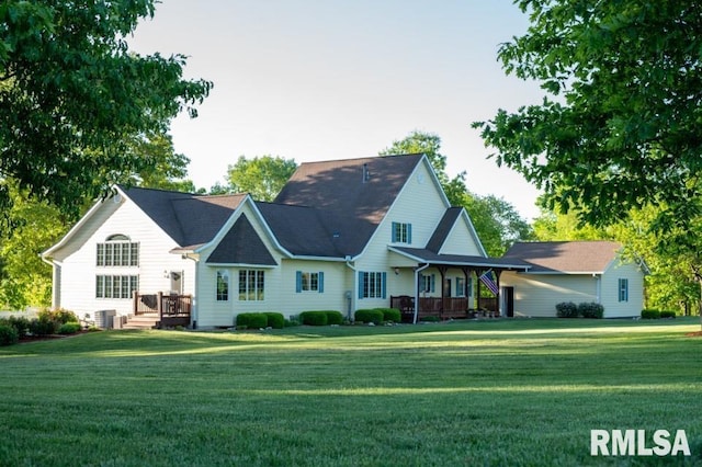 exterior space with a front yard and a deck