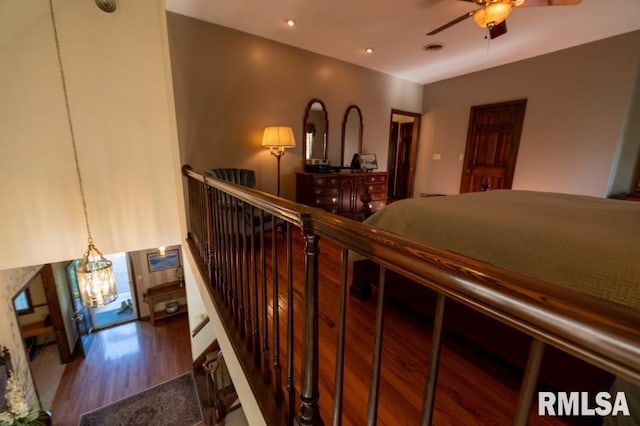 interior space featuring an inviting chandelier and dark wood-type flooring