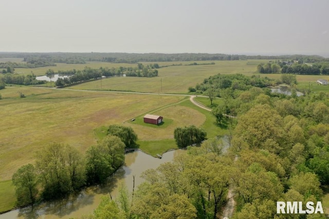 birds eye view of property with a rural view and a water view