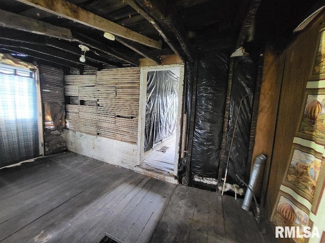 interior space with dark hardwood / wood-style flooring