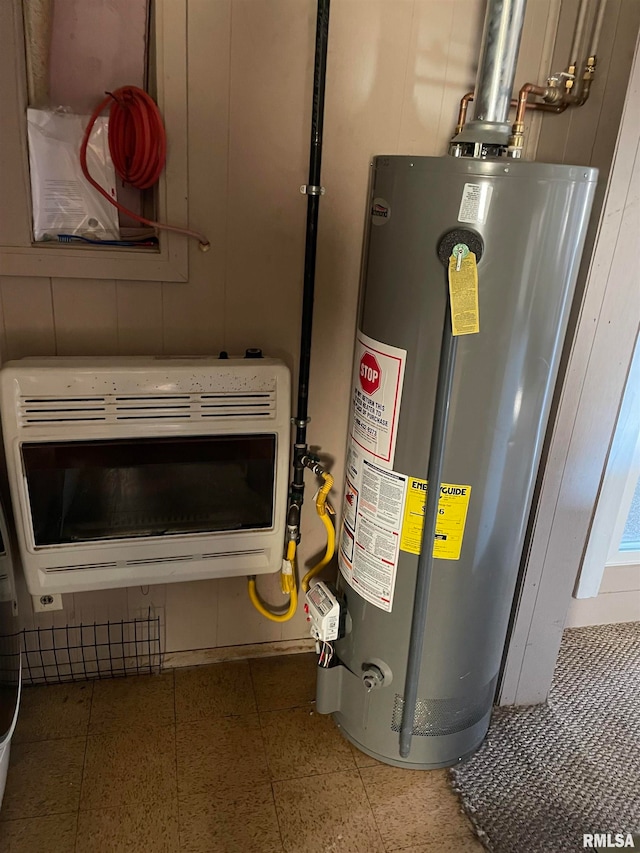 utility room with water heater