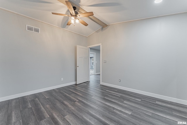 spare room with lofted ceiling with beams, ceiling fan, crown molding, and dark hardwood / wood-style flooring