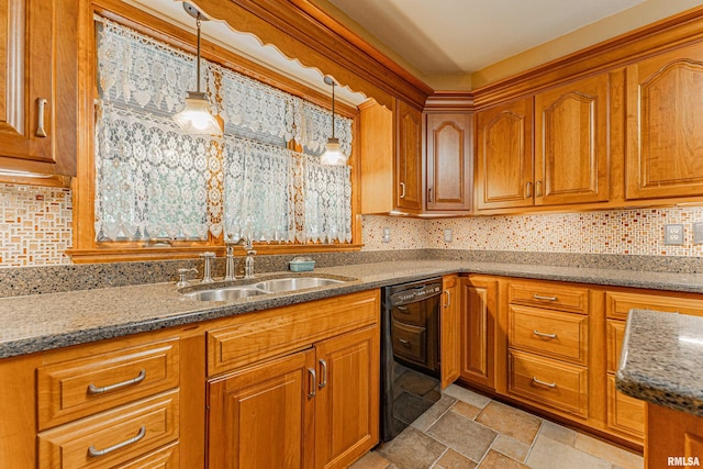 kitchen with black dishwasher, tasteful backsplash, sink, hanging light fixtures, and stone counters