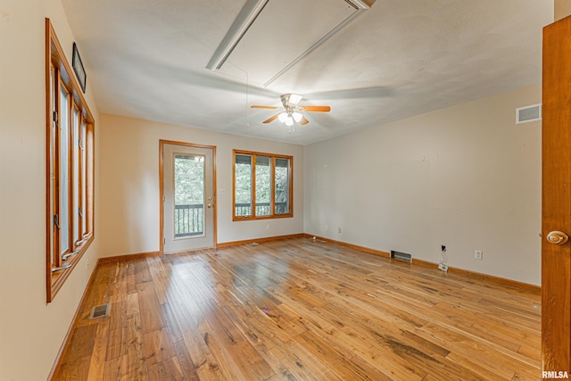 spare room featuring light wood-type flooring