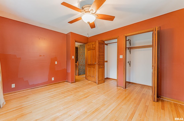 unfurnished bedroom featuring ceiling fan and light hardwood / wood-style flooring