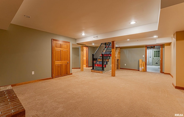 unfurnished living room featuring carpet floors