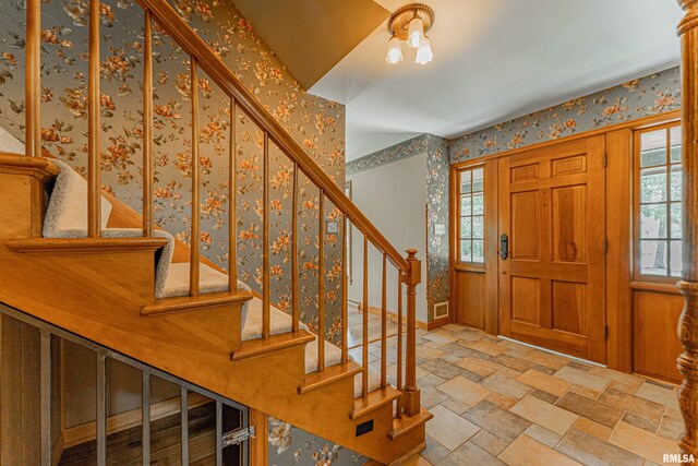 entrance foyer featuring a healthy amount of sunlight