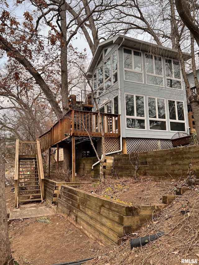 view of side of property with a deck