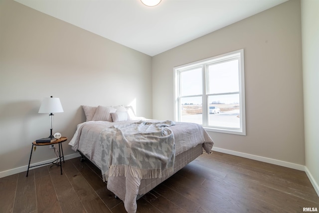 bedroom featuring dark hardwood / wood-style floors