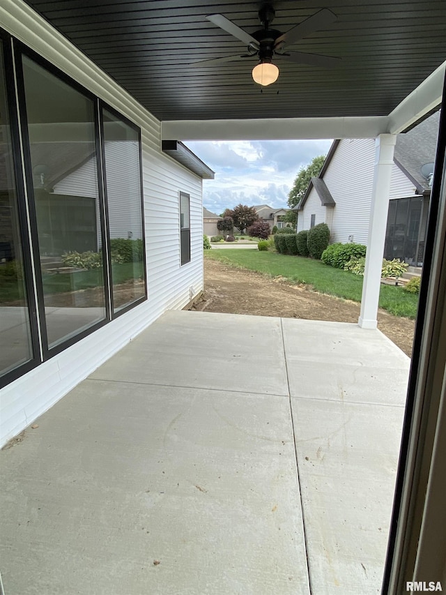 view of patio featuring ceiling fan