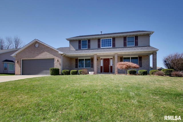 view of front facade with a front yard and a garage